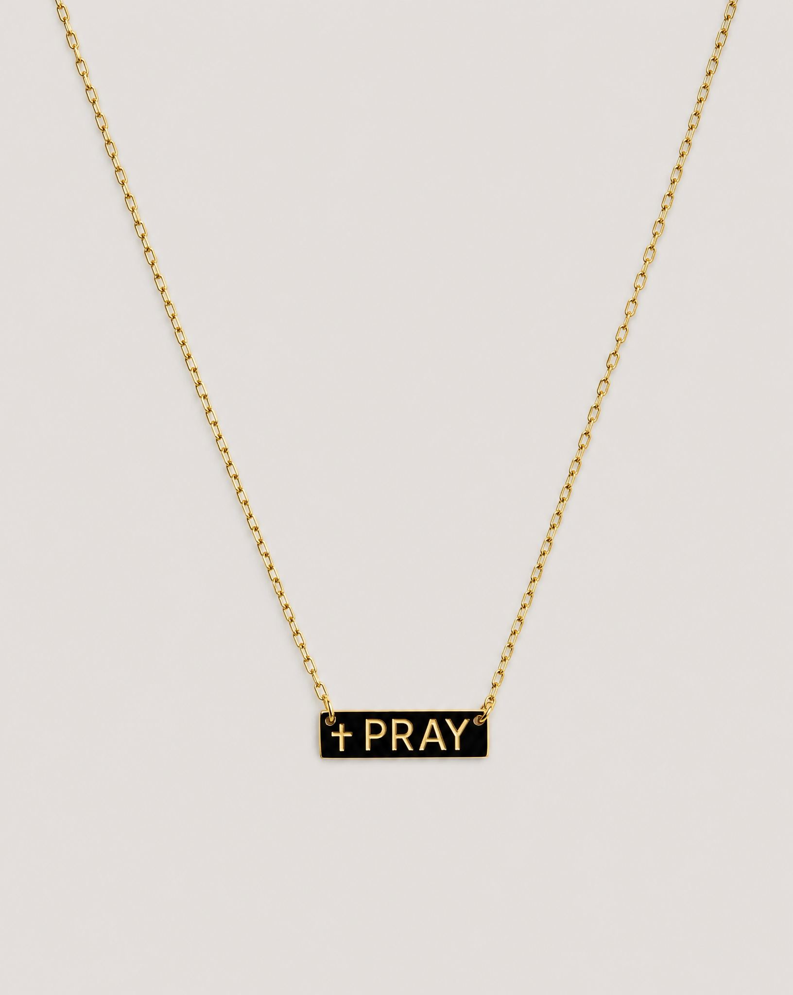 Gold "Pray" necklace pendant on chain - product shot