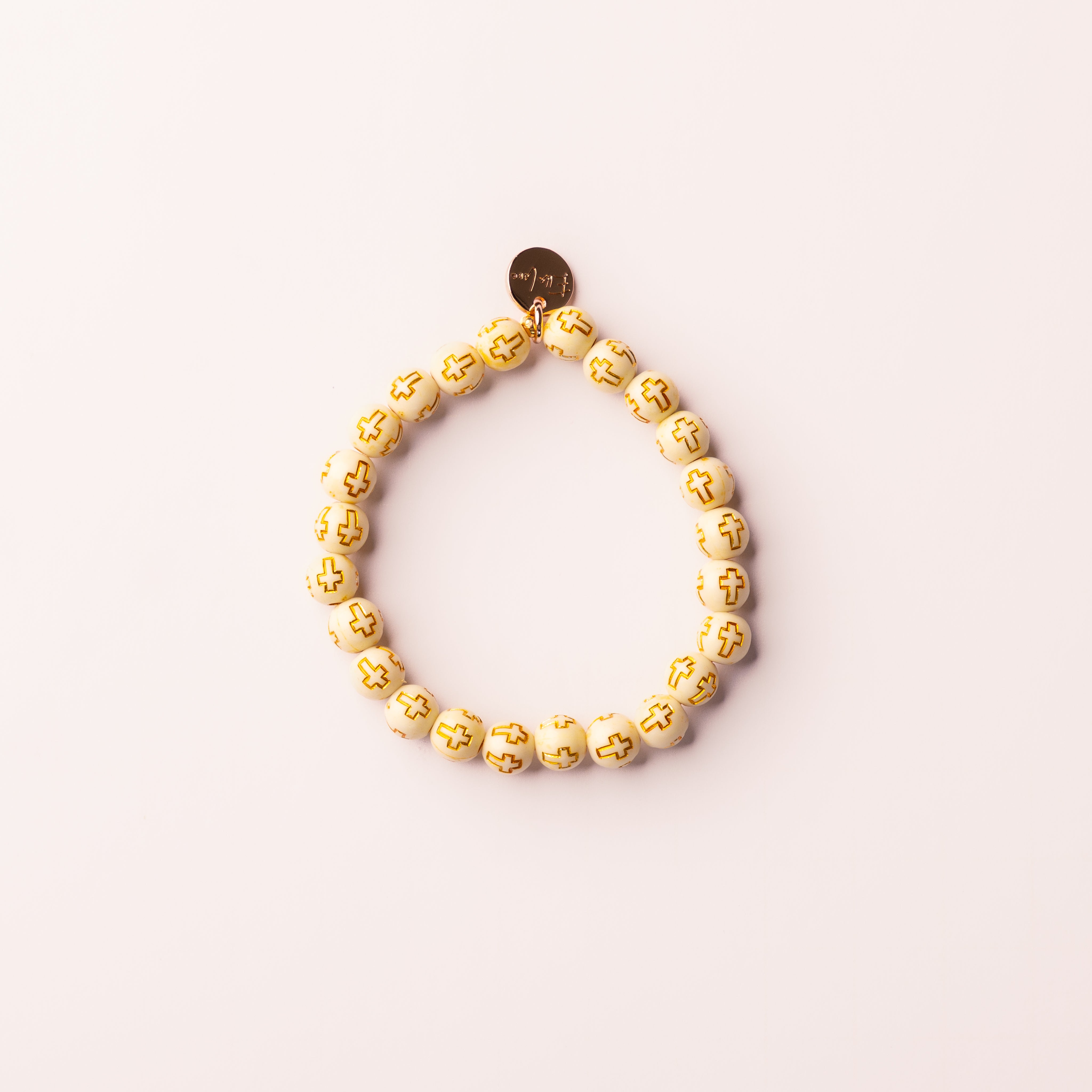 Golden Grace wood-look acrylic cross bead bracelet