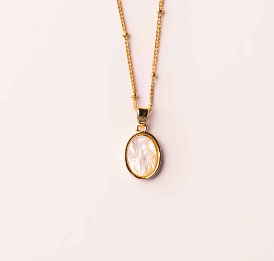 Divine Light necklace - close-up of Mother of Pearl medal pendant