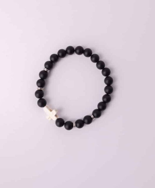 Faith & Boldness matte onyx cross bracelet - close-up