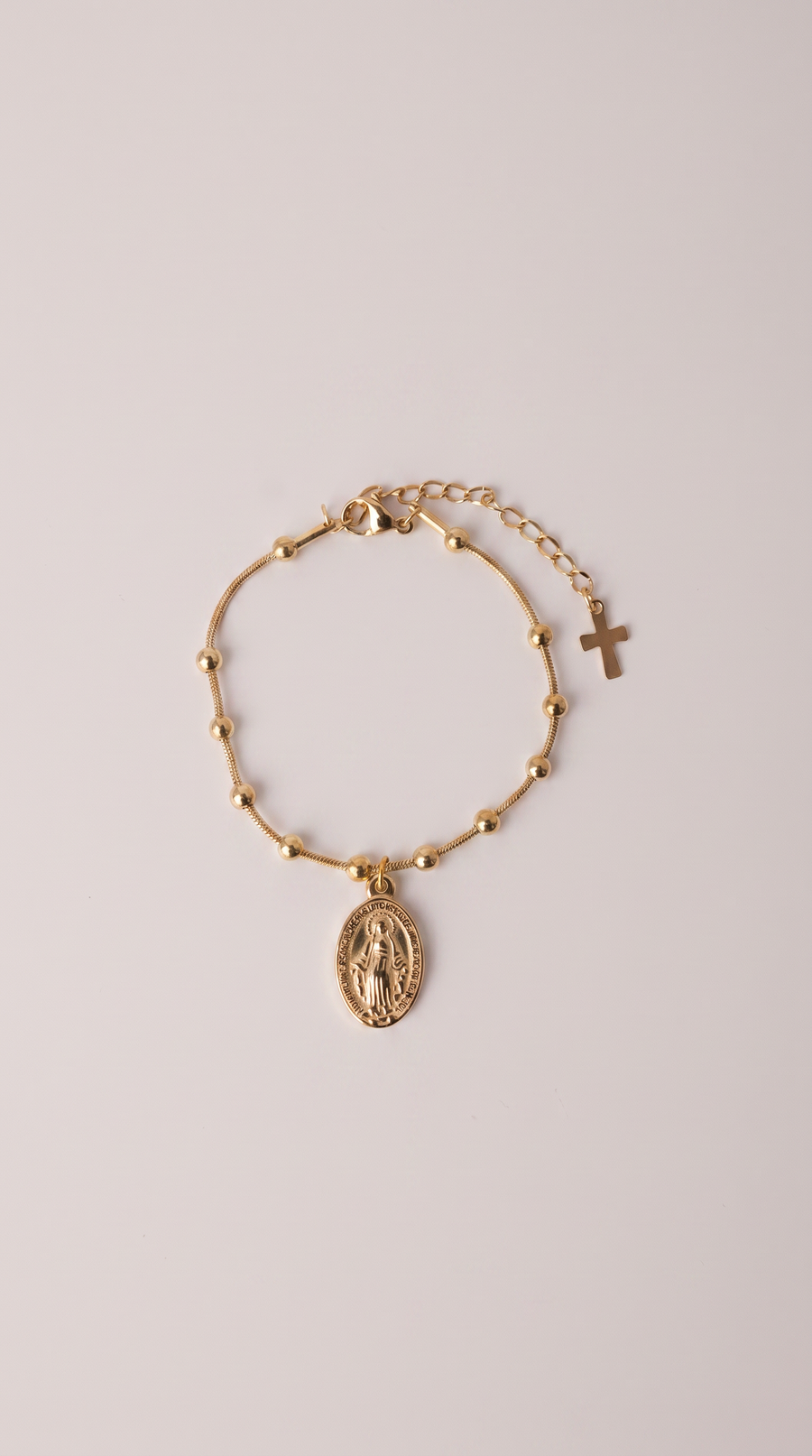 Blessed Grace gold medal bracelet - close-up styled photo