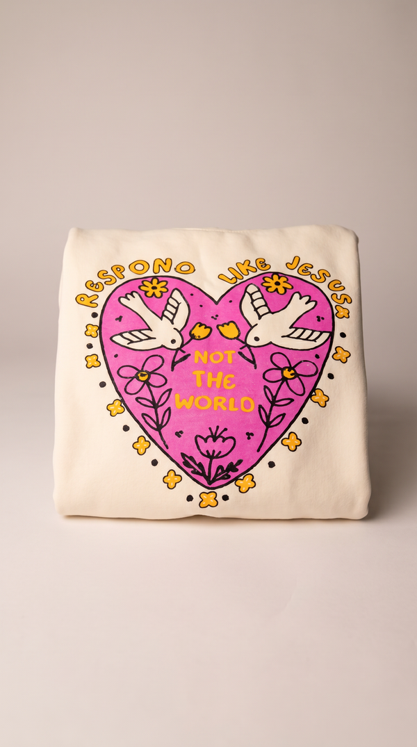 Christian youth hoodie with pink heart graphic "Respond Like Jesus, For the World" and dove design