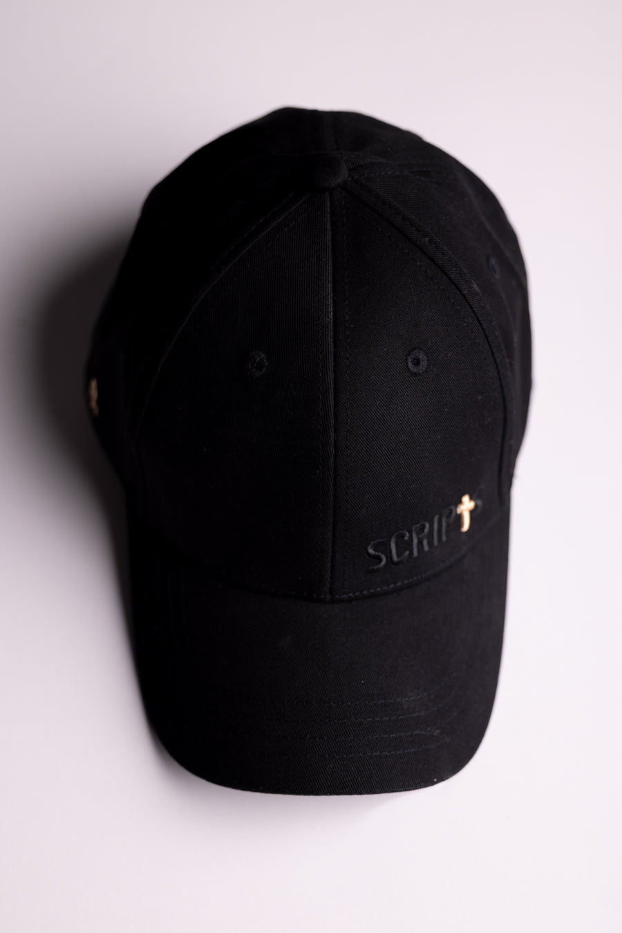Black Christian baseball cap with embroidered cross - side view