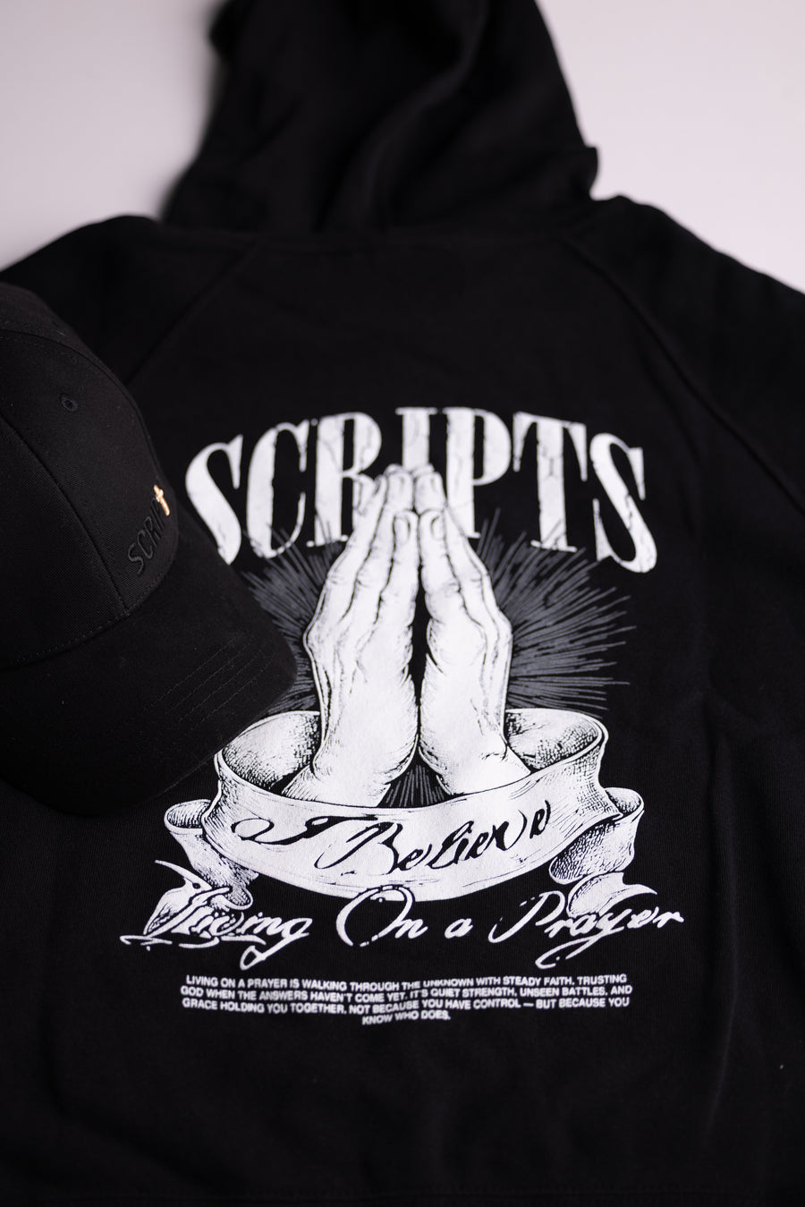 Christian youth hoodie back design - praying hands with "SCRIPTS, I Believe, Living on a Prayer"