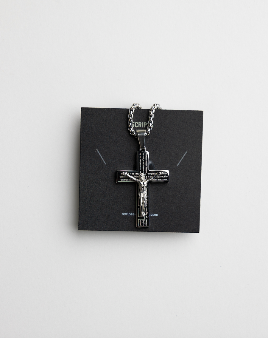 Christian crucifix pendant necklace - close-up on display card