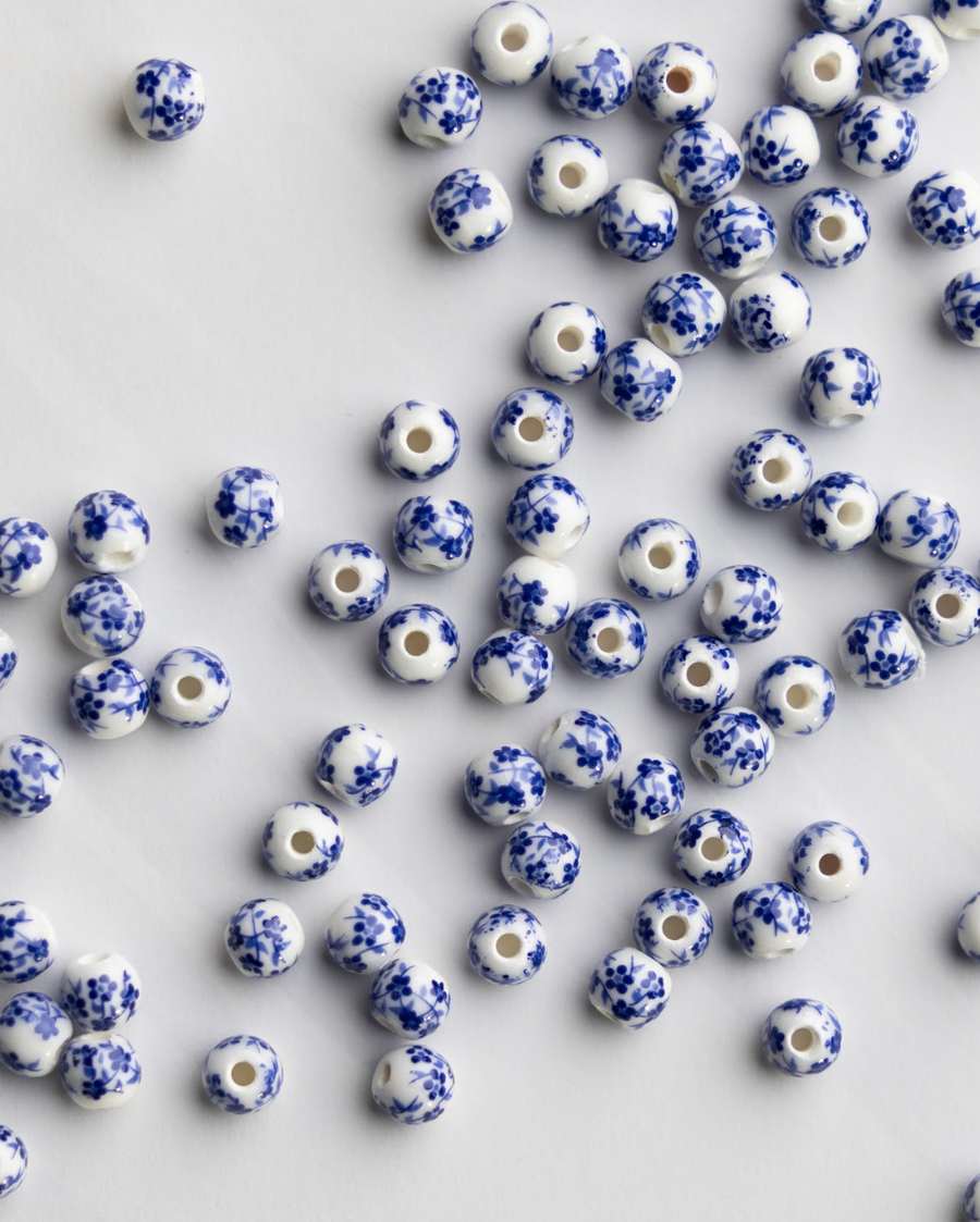 Mother of Pearl and blue beads for custom Christian rosary bracelet