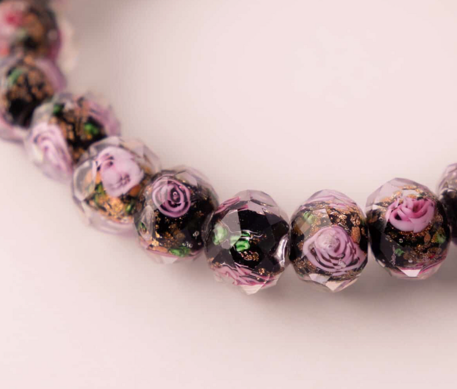 Black Rose Midnight Scripture bracelet - close-up of beads and charm