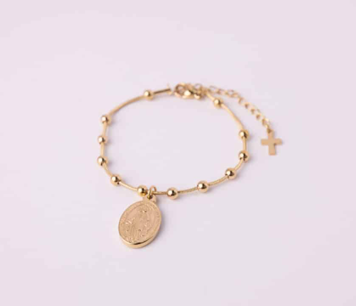 Blessed Grace gold medal bracelet - close-up of beads and medal