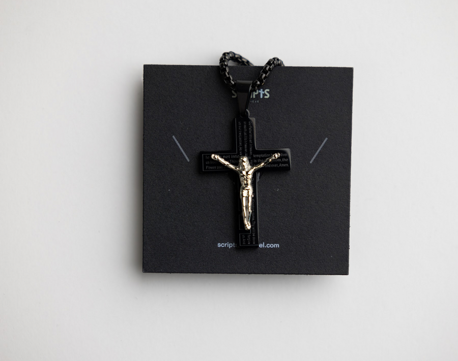 Black stainless steel crucifix pendant with Jesus figure on display card